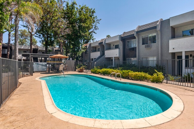 Enjoy a refreshing escape at Scripps Poway Villas' sparkling swimming pool, perfect for relaxation. - Scripps Poway Villas Apartments