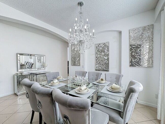 Photo - STUNNING Emerald Island Resort 5 bedroom 4.5 bath Luxury Home FULLY FURNISHED! 3 miles from Disney!