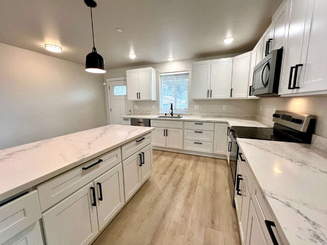 Photo - Modern 2022-Built Rambler on Private Lot with 2-Car Garage