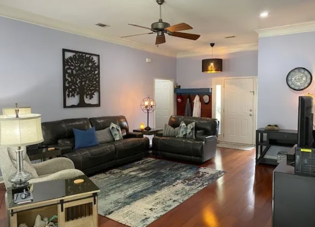 Photo - Stylish 3BR Home with Open Layout, Screened Porch & Fenced Yard