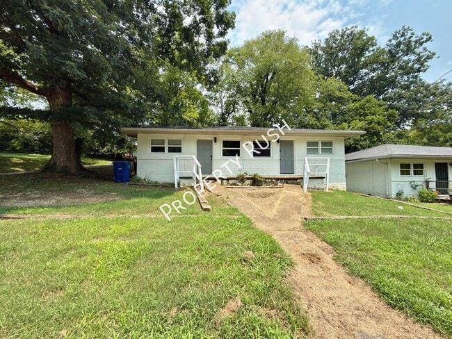 Building Photo - 708 W 47th St Unit B