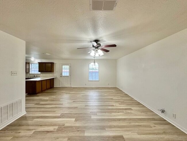 Newly Updated 3BR/2BA Corner Duplex in Lindale ISD! Fenced Yard & 1 Car Garage!