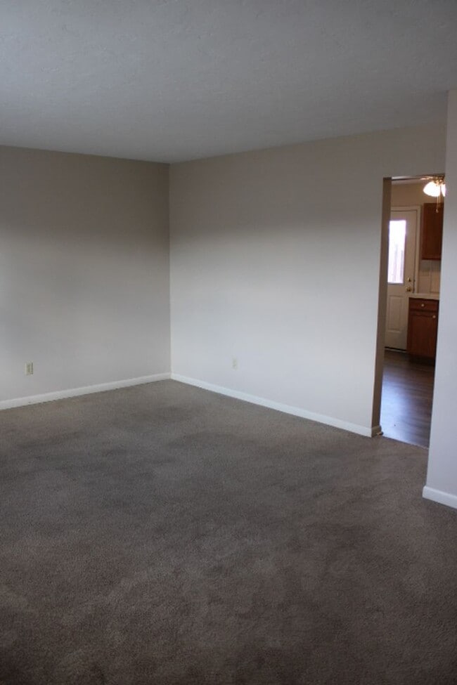 Photo - Move-In Ready 2BR Townhouse w/ Central AC & Off-Street Parking