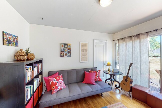 Bedroom or den with full wall to ceiling windows - 4108 50th Ave S