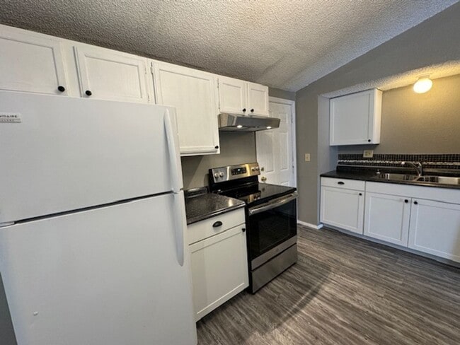 Photo - All New Inside, 3 bed 2 bath , no carpet, detached garage and fenced yard in Norman!