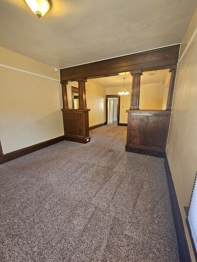 Photo - 1/2 OFF FIRST MONTH'S RENT IF RENTED IN DEC! Charming 2 Bedroom with Bonus/Laundry Room