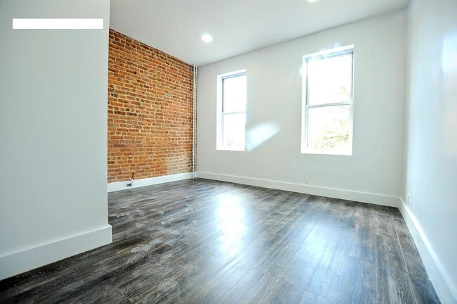 Photo - "Charming 2-Bed Oasis with Granite Touches... Apartment