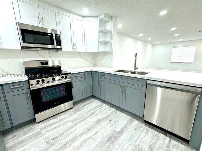 3665-3667-3667 NW 17th Way