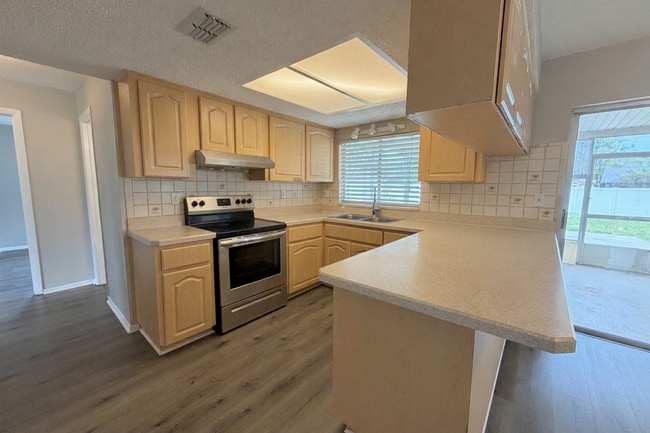 Photo - "Charming 3-Bed, 2-Bath Retreat in Spring Hill with 1,327 Sq Ft of Comfort!"