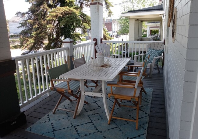 Front porch Hyde Park Square beyond. - 3549 Edwards Rd Apartment Unit 2 and 3 floors