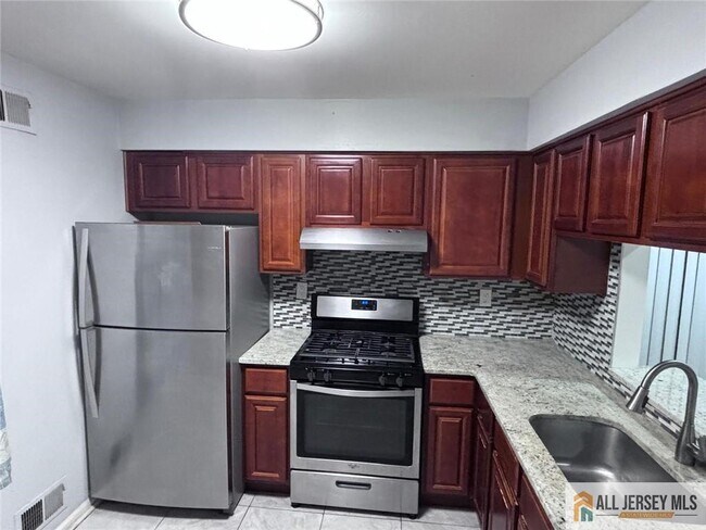 Photo - 103 Woodbridge Commons Way Unidad 103