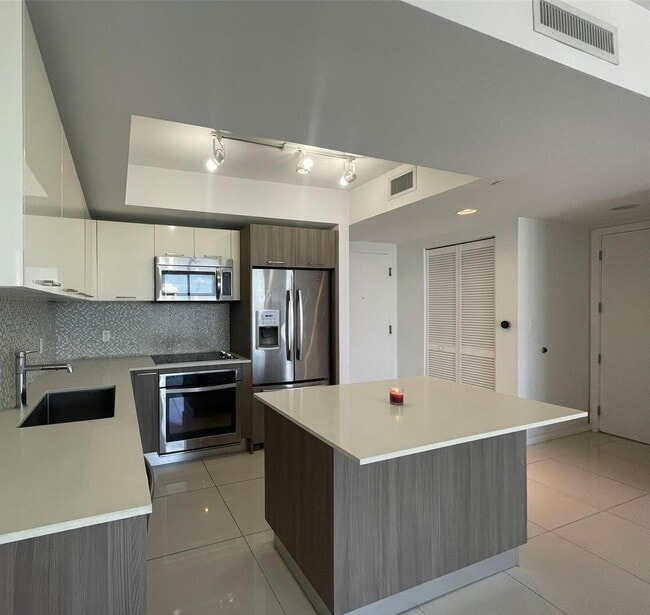 Building Photo - 5168 NW 84th Ave Unit 1808