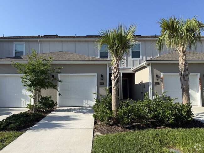Building Photo - "Charming 2-Bedroom Townhouse Retreat with...
