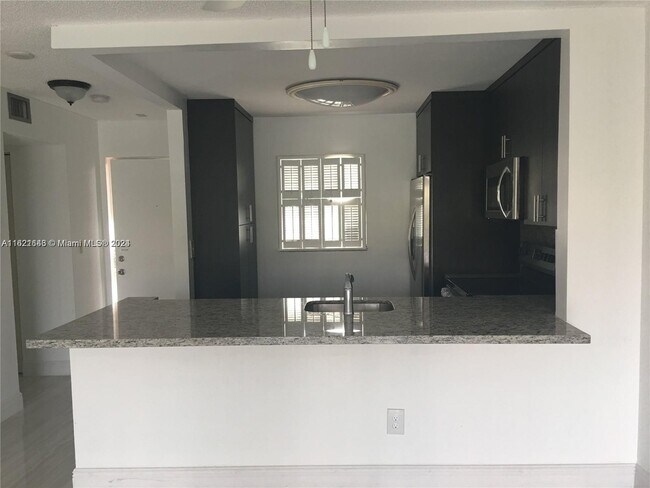 Photo - 7730 Camino Real Unit f306