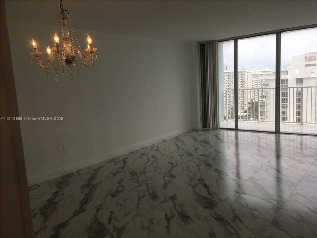 Photo - 5838 Collins Ave Unit PH-F