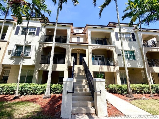 Building Photo - 5840 W Sample Rd Unit 303