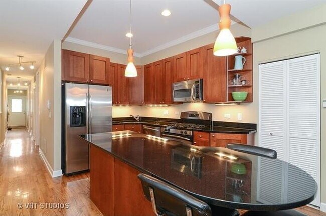 Photo - 2-Bed, 2-Bath Urban Retreat with Fireplace & Hardwood Floors Unit 2