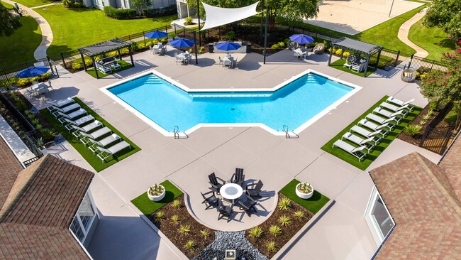 Enjoy a refreshing dip in the resort-style pool or relax on our expansive sundeck, complete with lounging areas, shaded seating, and a cozy fire pit. Perfect for relaxation and socializing on a sunny day. - MAISON Burbank Apartments