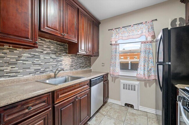 Photo - 87-37 Marengo St Condo Unit 1st Floor