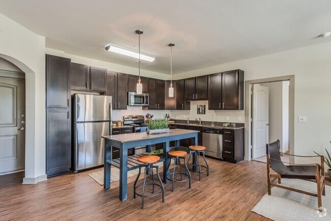 Building Photo - Live Bigger, Pay Less – Up to 6 Weeks Free! Unit AWS2 Rental