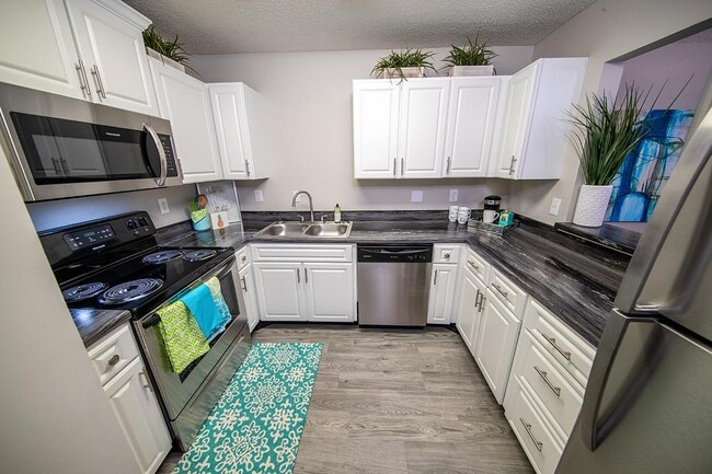 Building Photo - Havenly Park Villas Rental