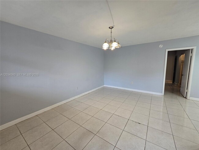 Building Photo - 1475 NE 125th Terrace Unit 304-B