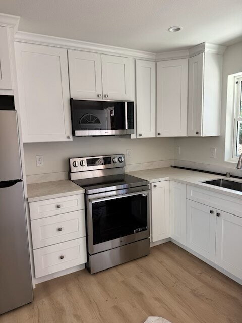 Photo - Move-in special: 50% off first month! **Br... Unit E