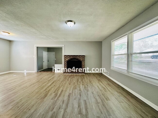 Photo - Ranch Style Home in KCMO w/ LVP Floors, SS Appliances and a Fenced Yard!