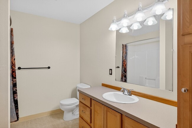 Photo - Charming Ranch Home with Hardwood Floors, Fireplace & Lush Curb Appeal