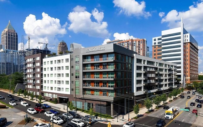Apartment Building With Tens on West Sign and Midtown Background - Tens on West Rental