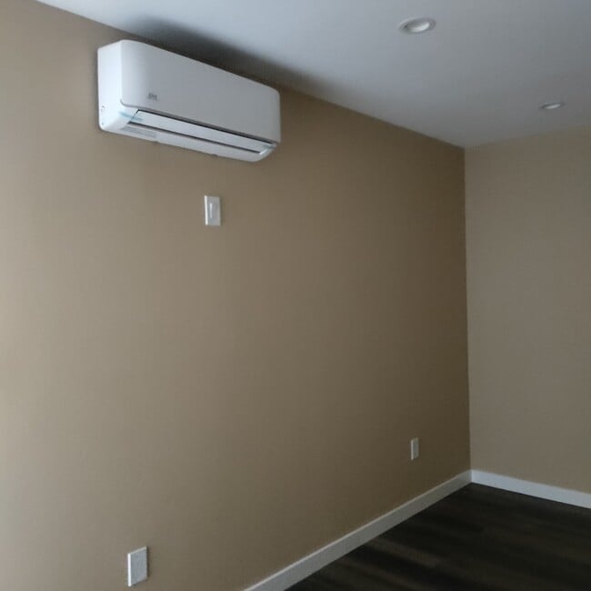 2 mini splits in bedroom and livingroom - 110 E 76th Pl Unit 110