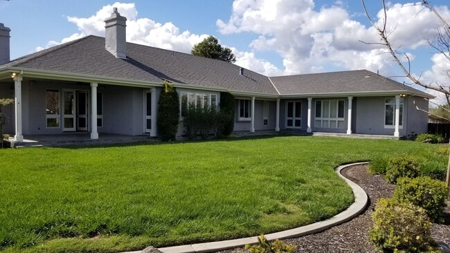 Building Photo - Gorgeous, Corner Lot with all the extras.