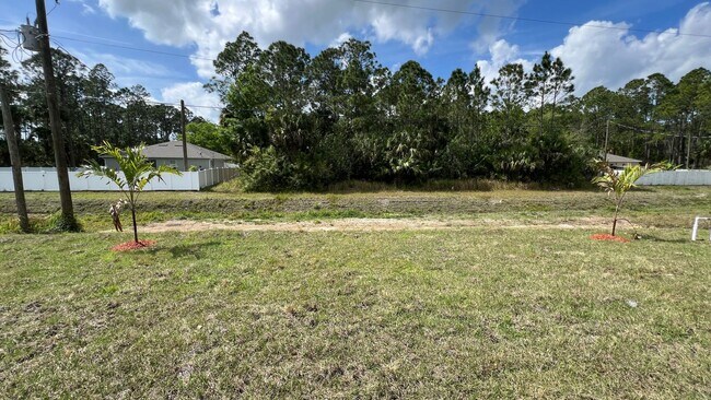 Photo - Smart & Stylish 3BD/2BA Palm Bay Home – Modern Upgrades, No Water Bills!