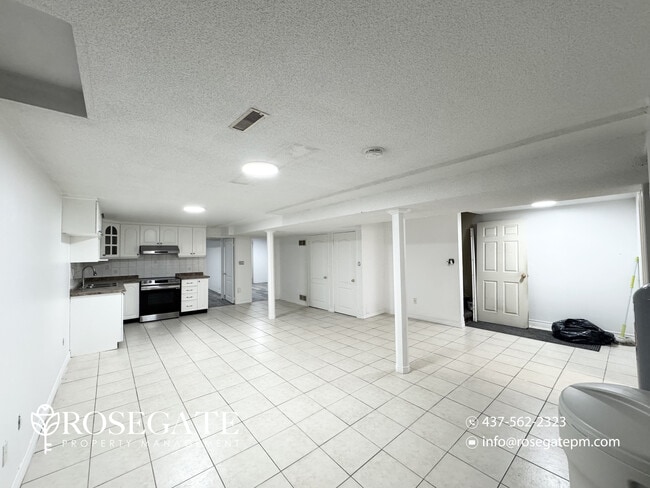 Photo - Spacious 2-Bedroom Basement Apartment with... Unit 2