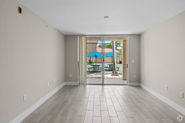 1 habitación, 1 baño - 751 pies cuadrados - Sala de estar - Vista Verde at Coconut Creek