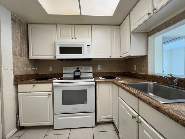 Building Photo - 7625 Tam Oshanter Blvd Unit 102-2 Rental