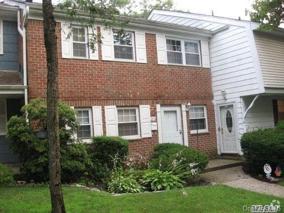 Building Photo - 211 Town House Village Unit 211