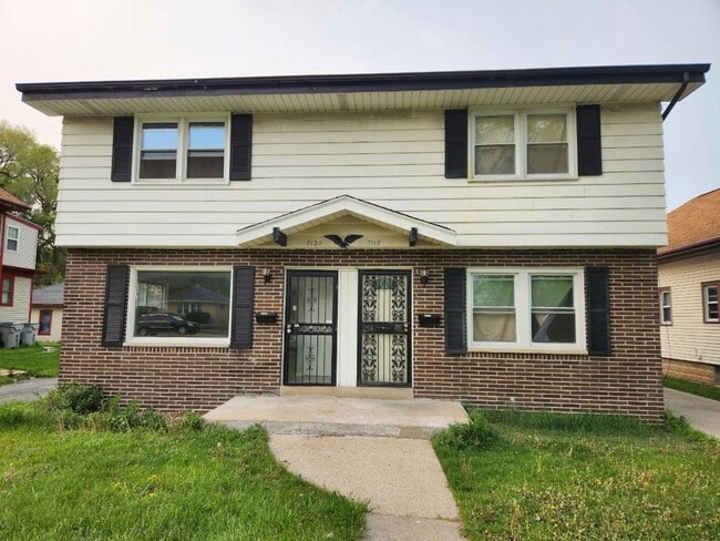 Building Photo - 7118-7120 W Villard Ave. Unit 7120