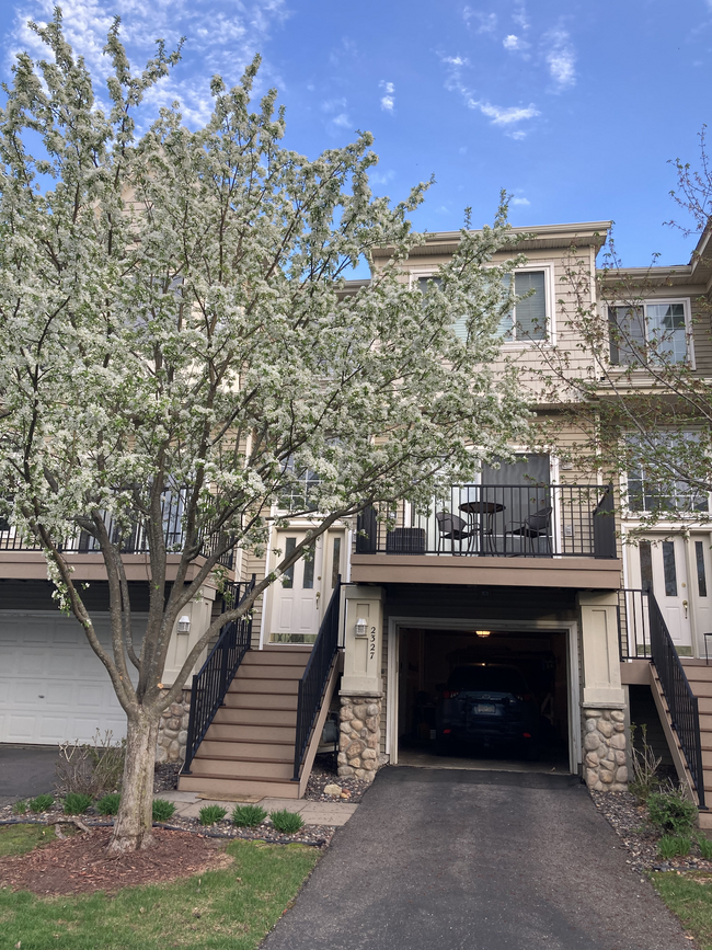 Front entry with beautiful landscaping - 2327 Eagle Trace Ln Townhome