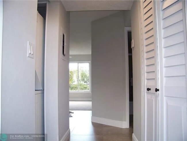 Building Photo - 3218 NW 103rd Terrace Unit 202B