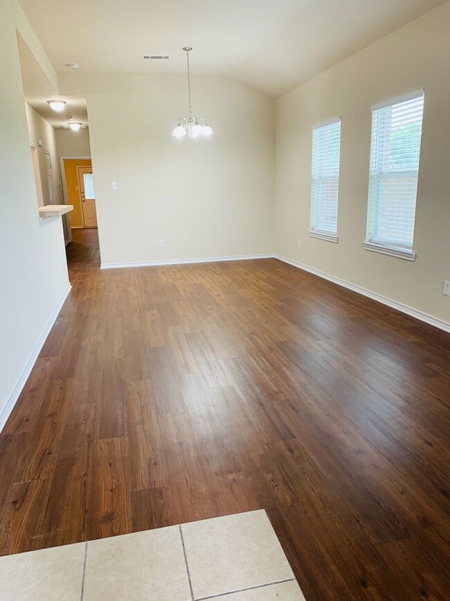 Photo - Charming 3/2 Duplex with Garage — No Carpet, Fenced Yard!