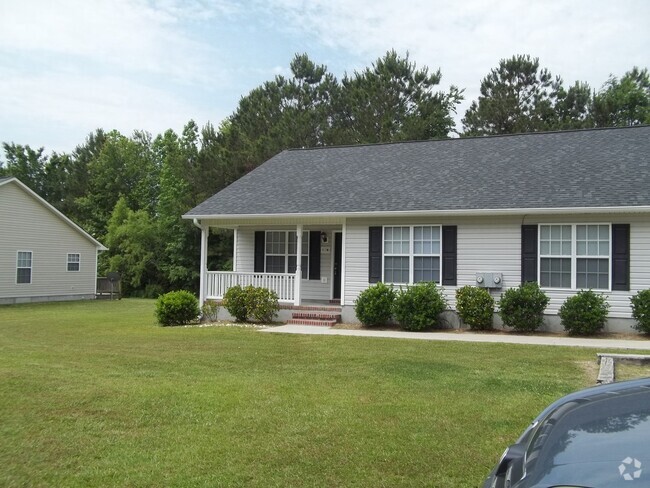 Building Photo - Owner takes care of Lawn and Trash Rental