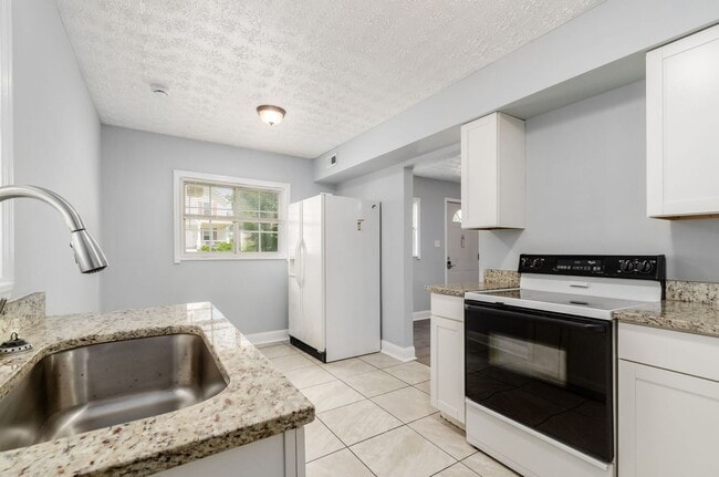Building Photo - 1061-1063 East 15th Avenue Unit 1061 Rental