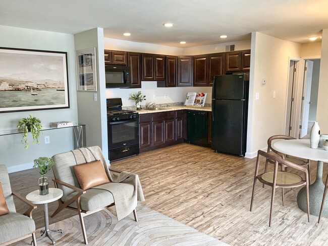 Open Floorplan with Luxury Vinyl Tile - Harpers Forest Apartments