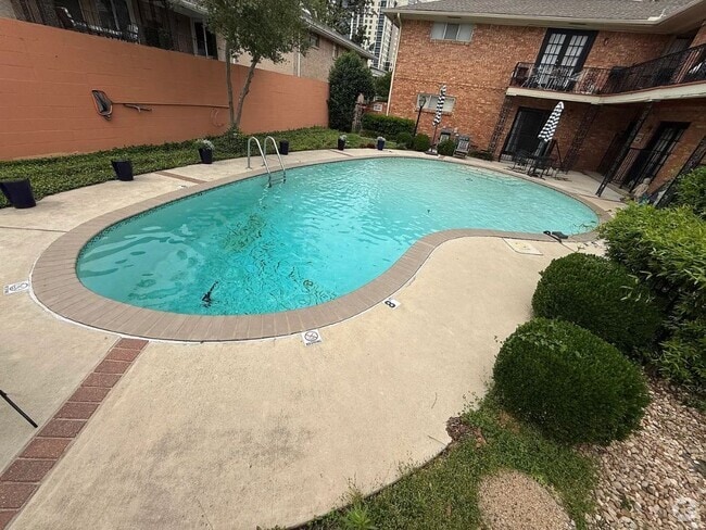 Building Photo - 8620 Baltimore Dr Unit #202 Rental