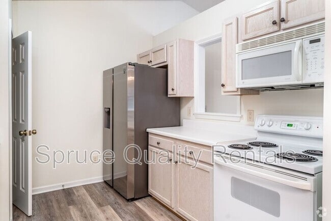 Building Photo - 7143 W Friendly Ave Unit E Rental