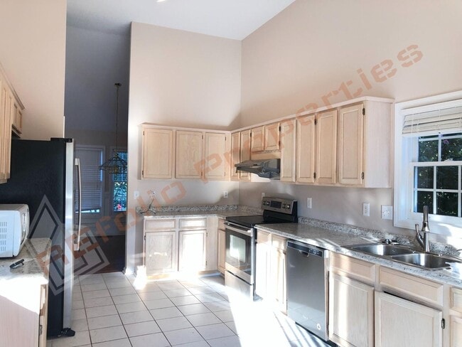 Photo - Elegant 4 Bedroom 2.5 Bath House w/ Primary Suite on 1st Floor + a Fenced-in Backyard @ Park Vill...