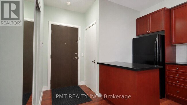 Photo - 125 Village Green Square Unit 309