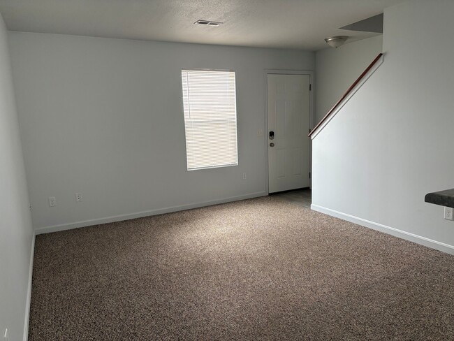 Sala de estar - Candlelight Apartments & Condos