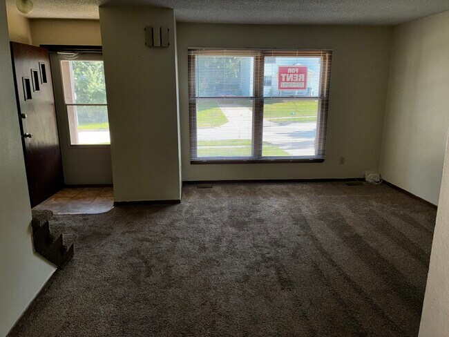A nice view of the living room and front door. - 1205 Randolph St